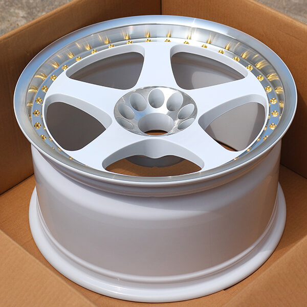 5 spoke white wheels with gold decorative rivets